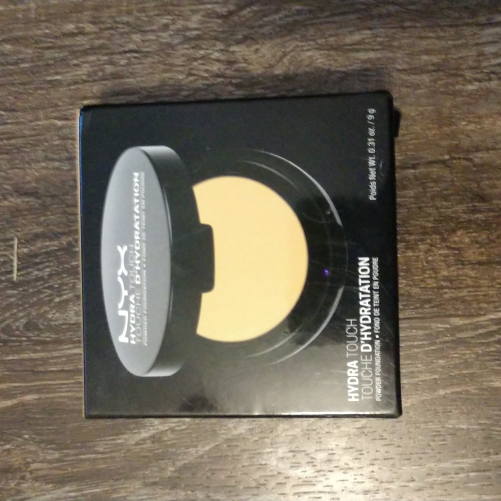 New NYX hydro touch powder foundation, Amber color, size.31 oz